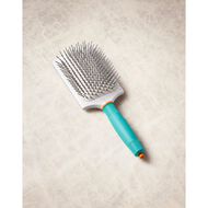 faces paddle brush