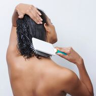 faces paddle brush