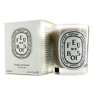 faces feu de bois candle