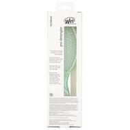 Pro Detangler – Teal faces pro detangler teal